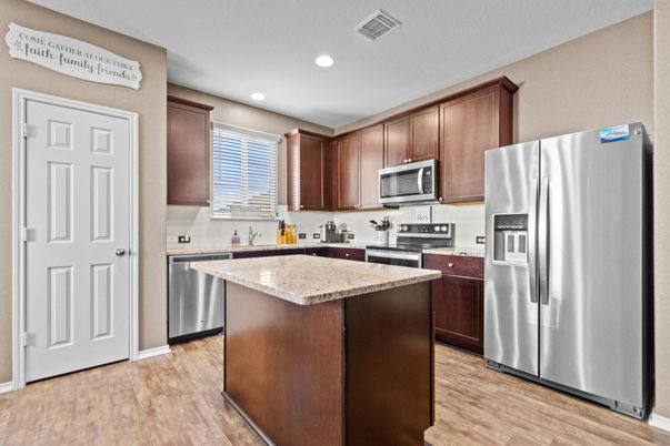 Interior, Kitchen, Recessed Lighting, Stainless Steel Appliances, Wood Texture Flooring