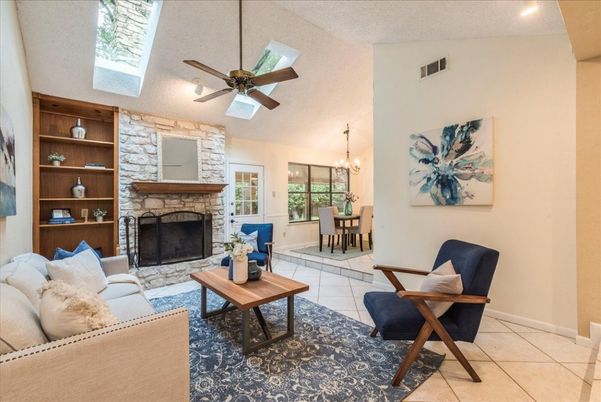 Chandelier, Dining room, Fireplace, Interior, Living room, Recessed Lighting, Stone Walls
