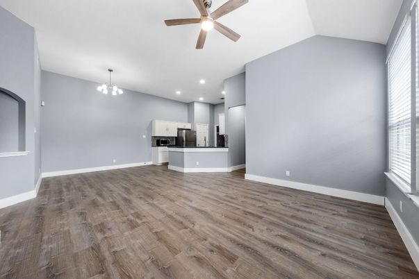 Chandelier, Empty room, Interior, Kitchen, Recessed Lighting, Stainless Steel Appliances, Wood Texture Flooring