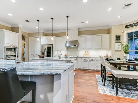 Dining room, Interior, Kitchen, Pendant Lights, Recessed Lighting, Stainless Steel Appliances, Wood Texture Flooring