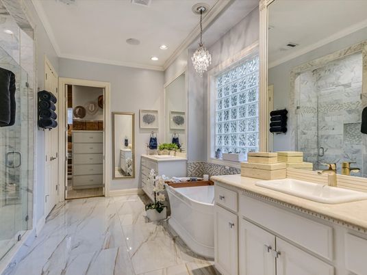 Bathroom, Chandelier, Dual Sink Vanities, Free Standing Baths, Glass Shower, Interior, Marble, Marble Walls, Recessed Lighting