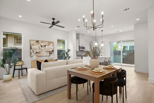 Chandelier, Dining room, Interior, Kitchen, Living room, Pendant Lights, Recessed Lighting, Stainless Steel Appliances, Wood Texture Flooring