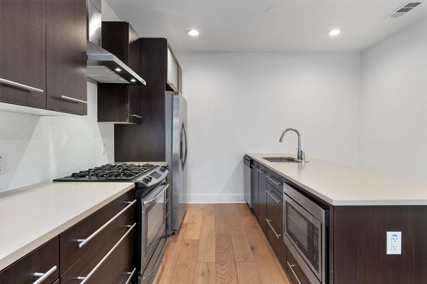 Interior, Kitchen, Recessed Lighting, Stainless Steel Appliances, Wood Texture Flooring