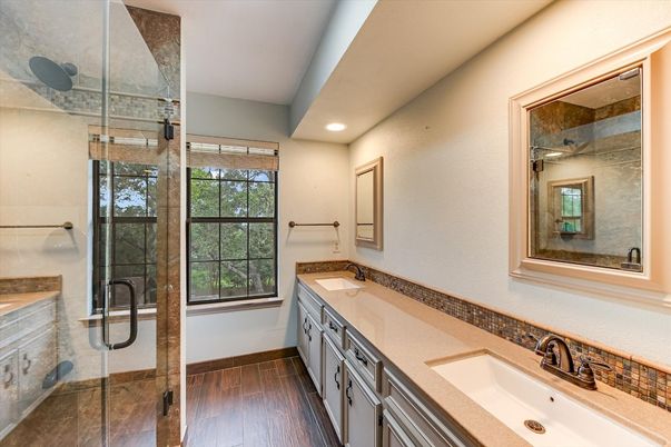 Bathroom, Dual Sink Vanities, Glass Shower, Interior, Recessed Lighting, Wood Texture Flooring