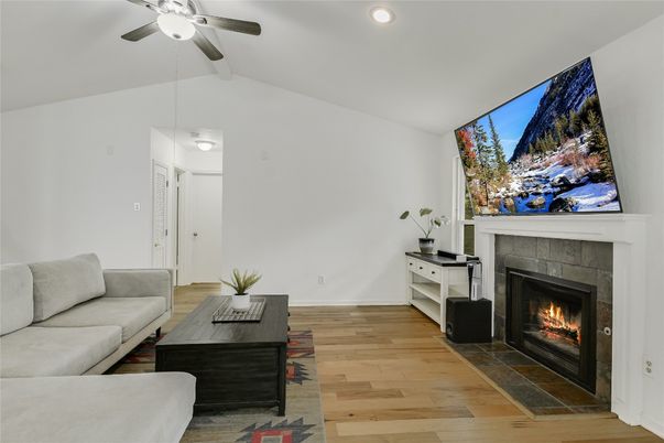 Fireplace, Interior, Living room, Recessed Lighting, Wood Texture Flooring