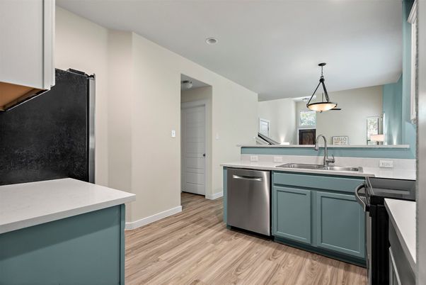 Dining room, Interior, Kitchen, Pendant Lights, Recessed Lighting, Stainless Steel Appliances, Wood Texture Flooring