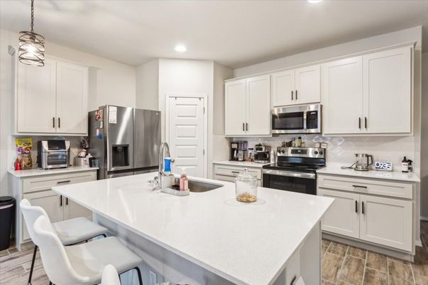 Interior, Kitchen, Pendant Lights, Recessed Lighting, Stainless Steel Appliances, Wood Texture Flooring