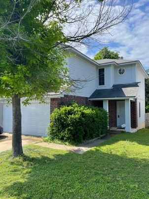 Attached, Backyard, Exterior, Facade, Brick Facade, Split Level