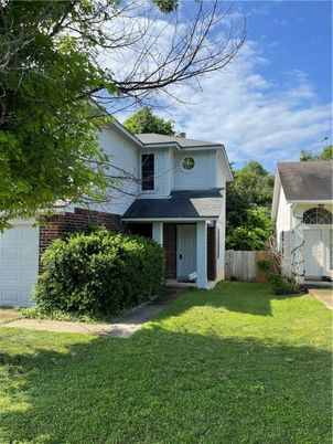 Attached, Backyard, Exterior, Facade, Brick Facade, None