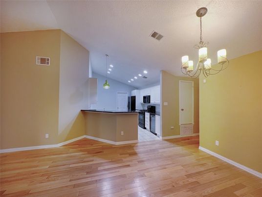 Chandelier, Empty room, Interior, Kitchen, Pendant Lights, Recessed Lighting, Wood Texture Flooring