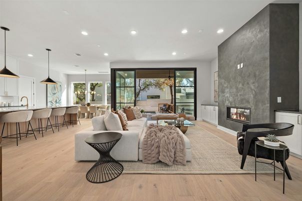 Dining room, Fireplace, Interior, Living room, Pendant Lights, Recessed Lighting, Wood Texture Flooring