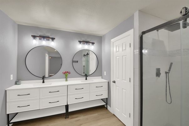 Bathroom, Dual Sink Vanities, Glass Shower, Interior, Wood Texture Flooring