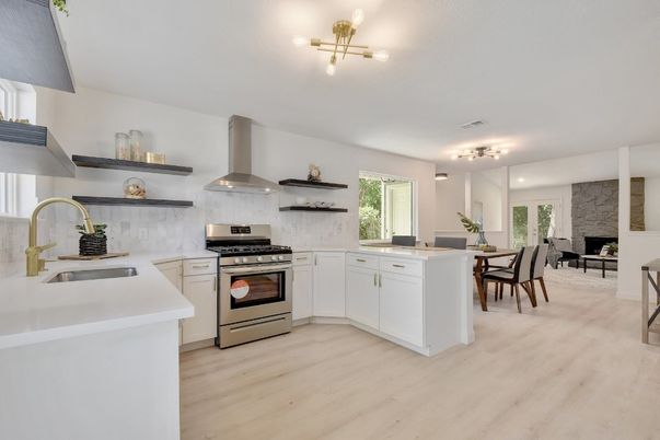 Dining room, Fireplace, Interior, Kitchen, Stainless Steel Appliances, Wood Texture Flooring