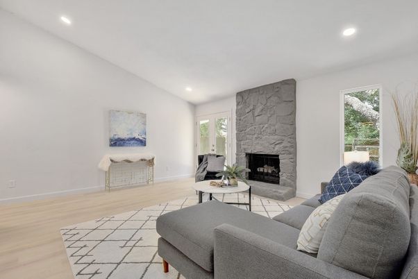 Fireplace, Interior, Living room, Recessed Lighting, Stone Walls, Wood Texture Flooring