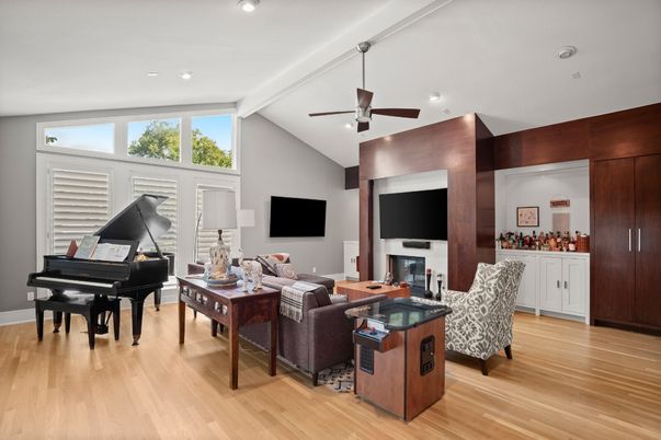 Fireplace, Interior, Living room, Piano, Recessed Lighting, Wood Texture Flooring