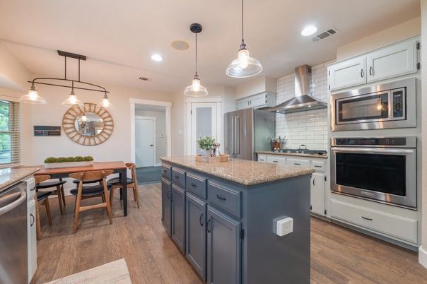 Dining room, Interior, Kitchen, Pendant Lights, Recessed Lighting, Stainless Steel Appliances, Wood Texture Flooring
