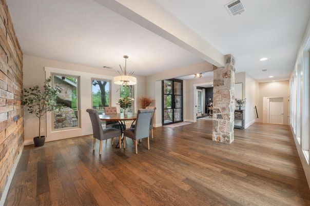 Dining room, Fireplace, Interior, Pendant Lights, Recessed Lighting, Stone Walls, Wood Texture Flooring