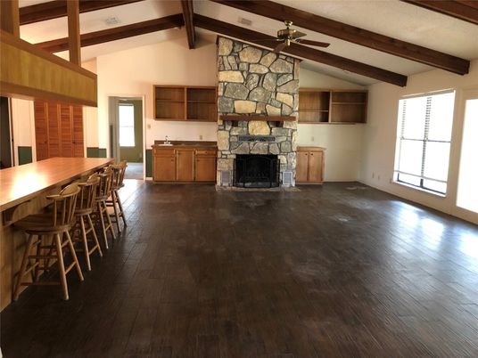 Empty room, Fireplace, Interior, Stone Walls, Wooden Beams, Wood Texture Flooring