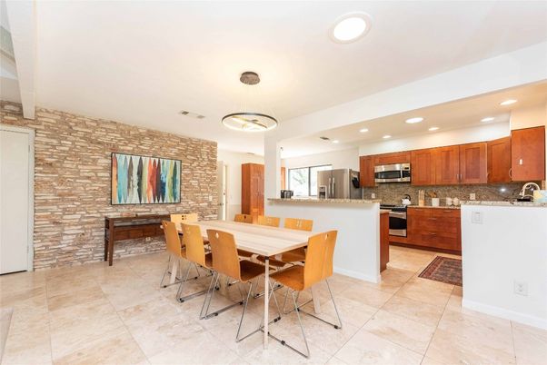 Dining room, Interior, Kitchen, Pendant Lights, Recessed Lighting, Stainless Steel Appliances, Stone Walls