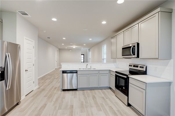 Interior, Kitchen, Recessed Lighting, Stainless Steel Appliances, Wood Texture Flooring