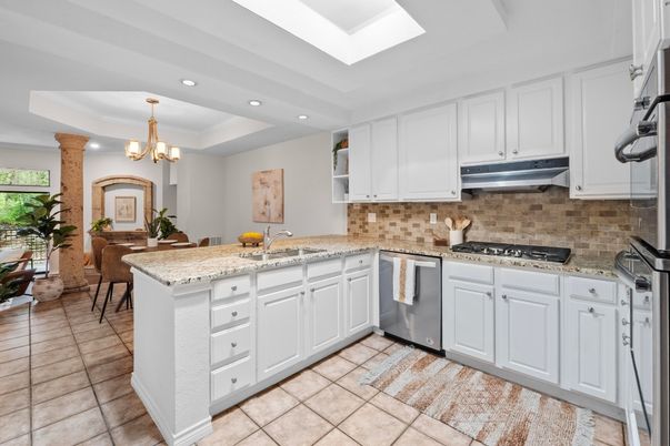 Chandelier, Dining room, Interior, Kitchen, Recessed Lighting, Stainless Steel Appliances, Stone Walls