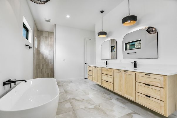 Bathroom, Dual Sink Vanities, Free Standing Baths, Interior, Marble, Pendant Lights, Recessed Lighting