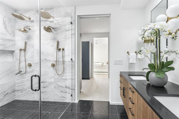 Bathroom, Dual Sink Vanities, Glass Shower, Interior, Marble Walls, Recessed Lighting