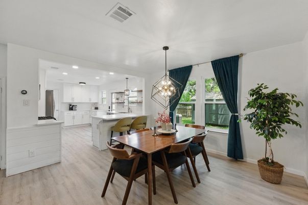 Dining room, Interior, Kitchen, Pendant Lights, Recessed Lighting, Stainless Steel Appliances, Wood Texture Flooring