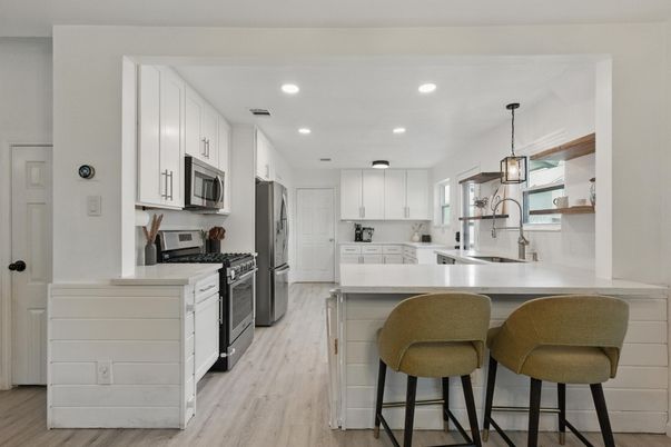 Interior, Kitchen, Pendant Lights, Recessed Lighting, Stainless Steel Appliances, Wood Texture Flooring