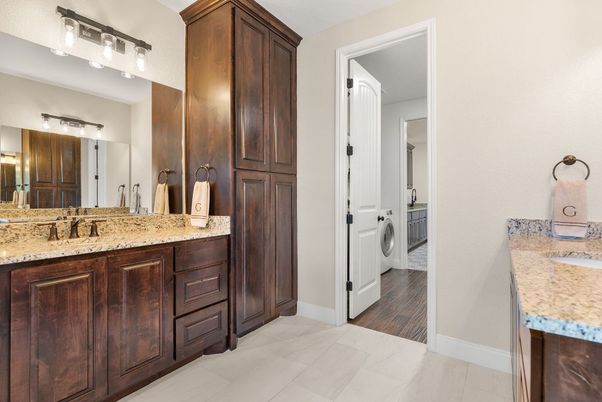 Bathroom, Dual Sink Vanities, Interior, Washer, Wood Texture Flooring
