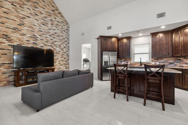 Interior, Kitchen, Living room, Marble, Recessed Lighting, Stainless Steel Appliances, Stone Walls