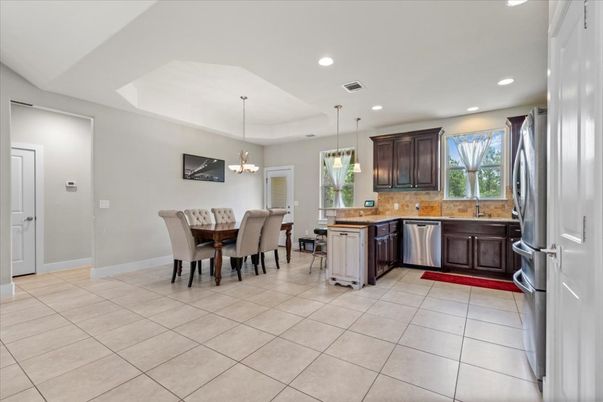 Chandelier, Dining room, Interior, Kitchen, Pendant Lights, Recessed Lighting, Stainless Steel Appliances