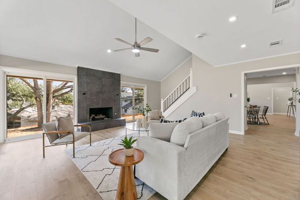 Dining room, Fireplace, Interior, Living room, Recessed Lighting, Wood Texture Flooring