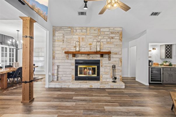 Dining room, Fireplace, Interior, Pendant Lights, Stone Walls, Wood Texture Flooring