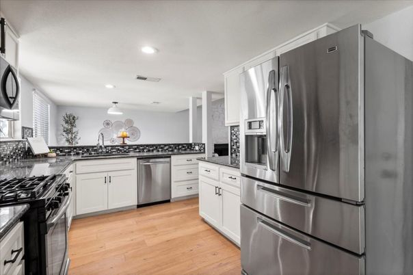 Interior, Kitchen, Pendant Lights, Recessed Lighting, Stainless Steel Appliances, Wood Texture Flooring