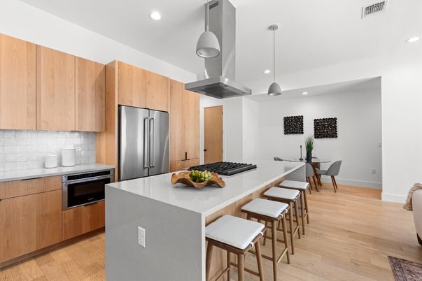 Dining room, Interior, Kitchen, Pendant Lights, Recessed Lighting, Stainless Steel Appliances, Wood Texture Flooring