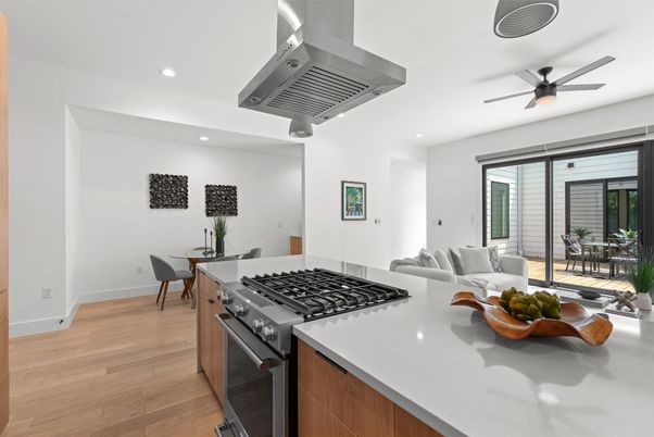 Dining room, Interior, Kitchen, Living room, Recessed Lighting, Stainless Steel Appliances, Wood Texture Flooring