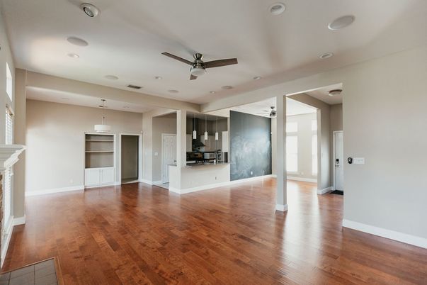 Empty room, Fireplace, Interior, Kitchen, Recessed Lighting, Wood Texture Flooring