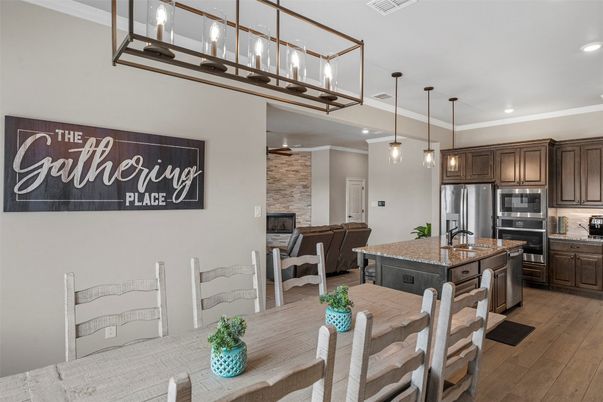 Fireplace, Interior, Living room, Recessed Lighting, Stone Walls, Wood Texture Flooring