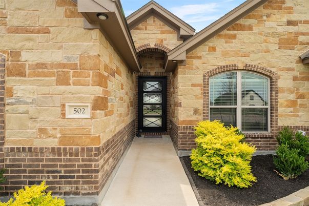 Attached, Backyard, Exterior, Facade, Brick Facade, Brick Traditional