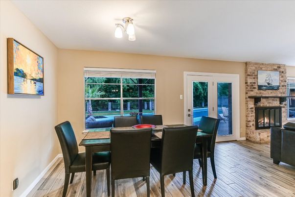 Dining room, Fireplace, Interior, Stone Walls, Wood Texture Flooring