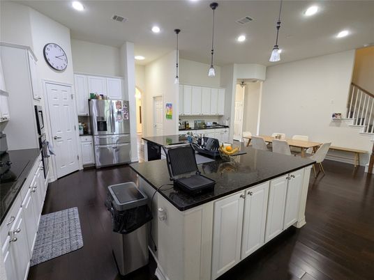 Dining room, Interior, Kitchen, Pendant Lights, Recessed Lighting, Stainless Steel Appliances, Wood Texture Flooring