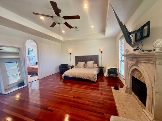 Bedroom, Fireplace, Interior, Recessed Lighting, Wood Texture Flooring