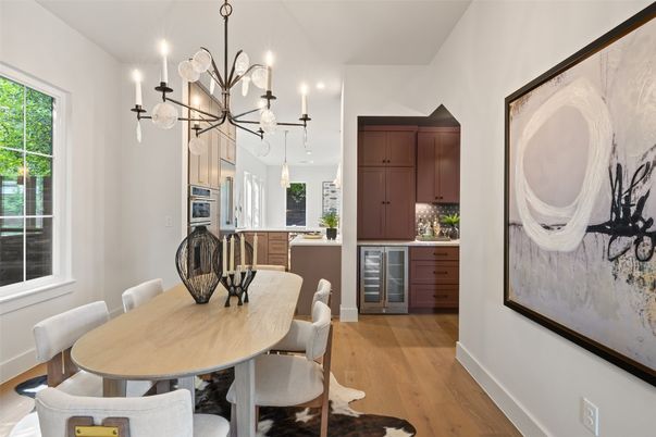 Chandelier, Dining room, Interior, Kitchen, Pendant Lights, Recessed Lighting, Stainless Steel Appliances, Wood Texture Flooring
