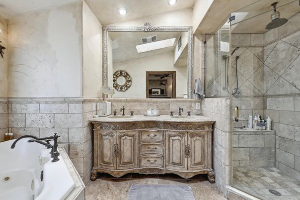 Bathroom, Dual Sink Vanities, Glass Shower, Interior, Recessed Lighting, Stone Walls