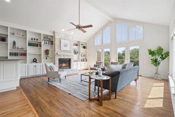 Fireplace, Interior, Living room, Recessed Lighting, Stone Walls, Wood Texture Flooring