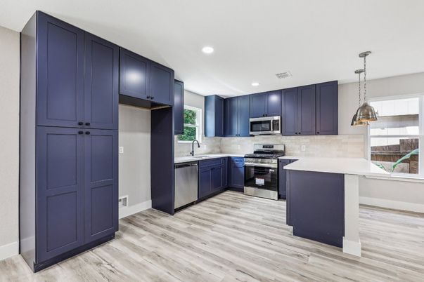 Interior, Kitchen, Pendant Lights, Recessed Lighting, Stainless Steel Appliances, Wood Texture Flooring