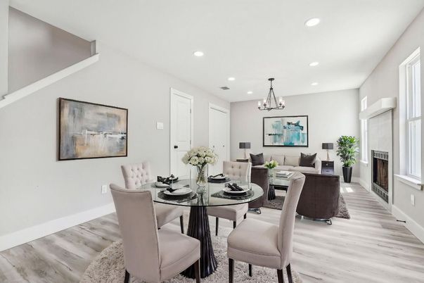 Chandelier, Dining room, Fireplace, Interior, Living room, Recessed Lighting, Wood Texture Flooring