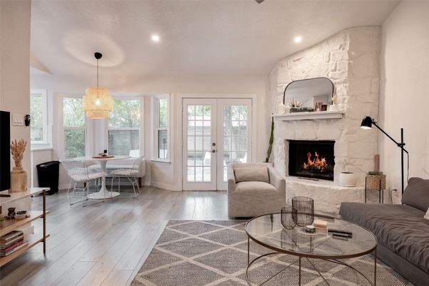 Dining room, Fireplace, Interior, Living room, Pendant Lights, Recessed Lighting, Stone Walls, Wood Texture Flooring