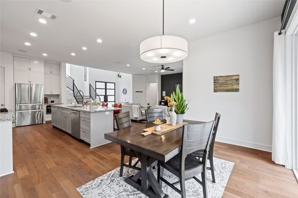Dining room, Interior, Kitchen, Living room, Pendant Lights, Recessed Lighting, Stainless Steel Appliances, Wood Texture Flooring